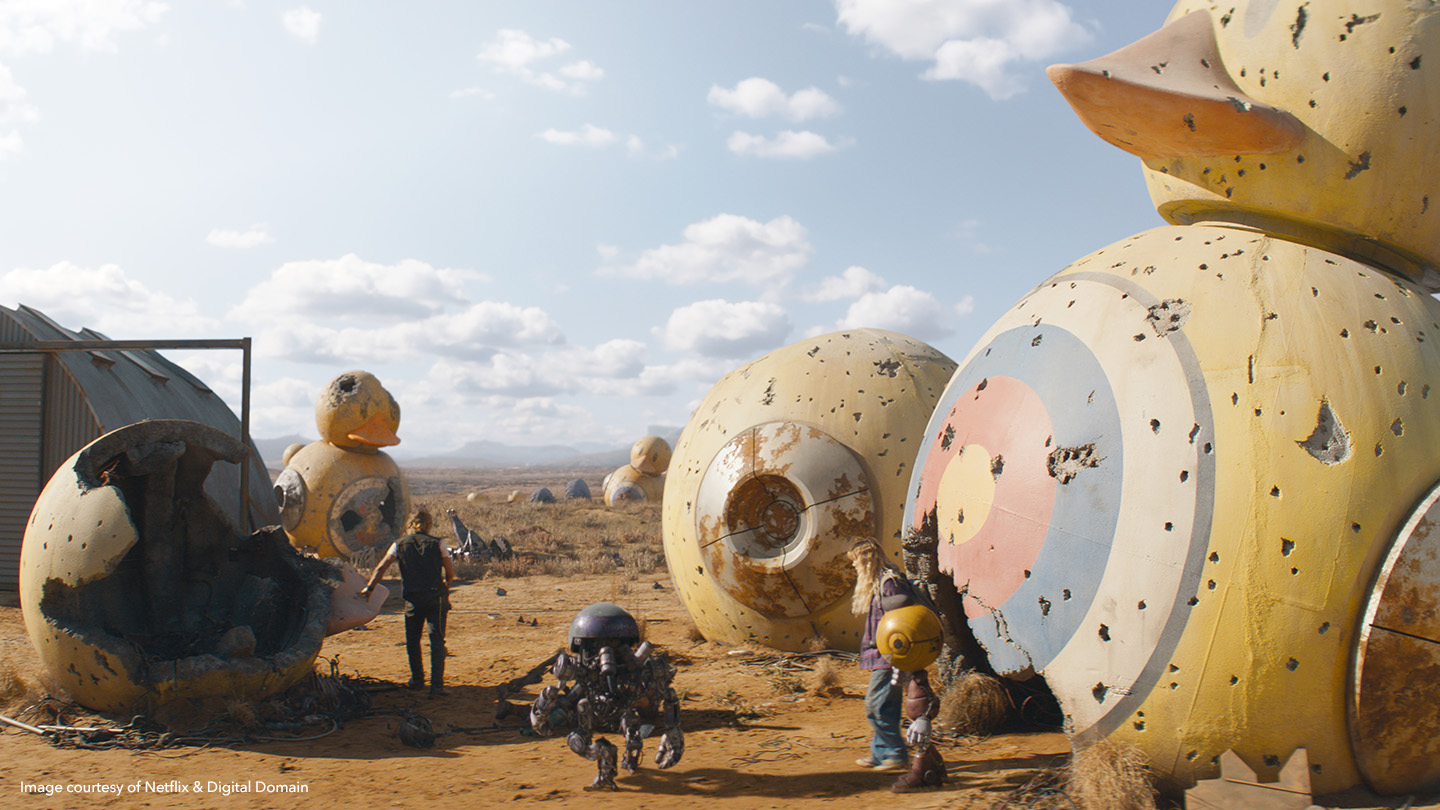 Robots walking in dystopian wasteland in The Electric State