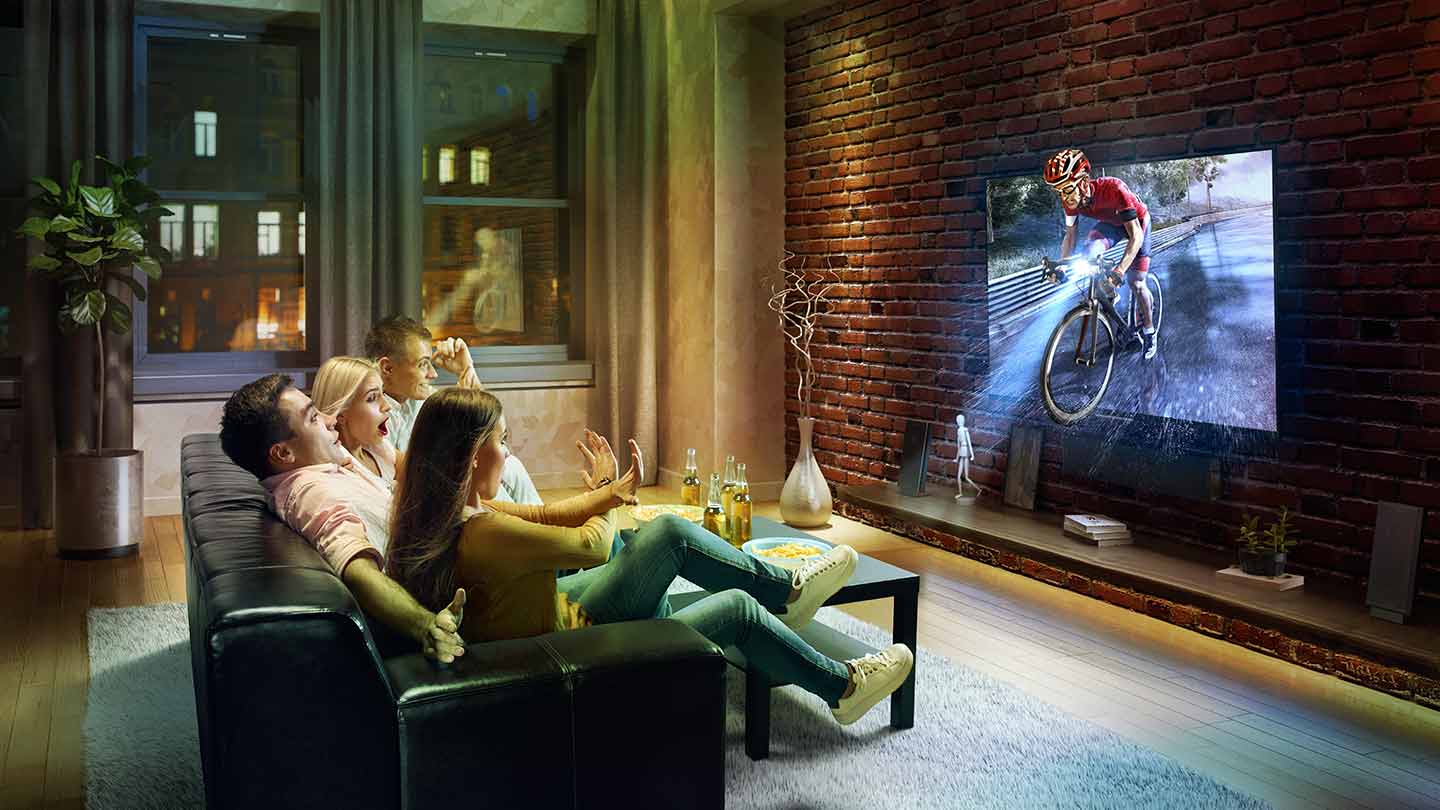 Family watching 3D Cyclist in TV