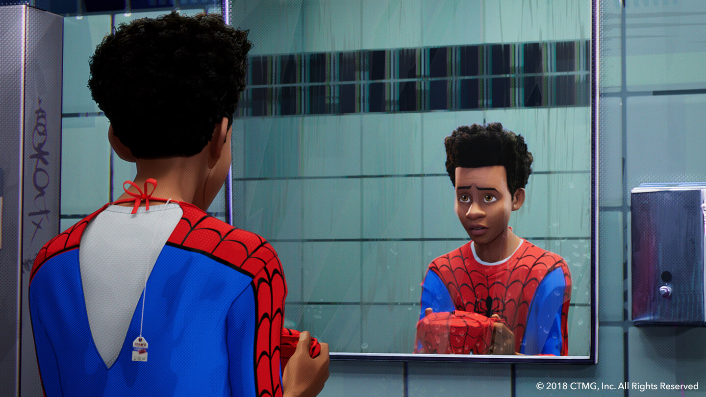 Young Spiderman looking into a mirror